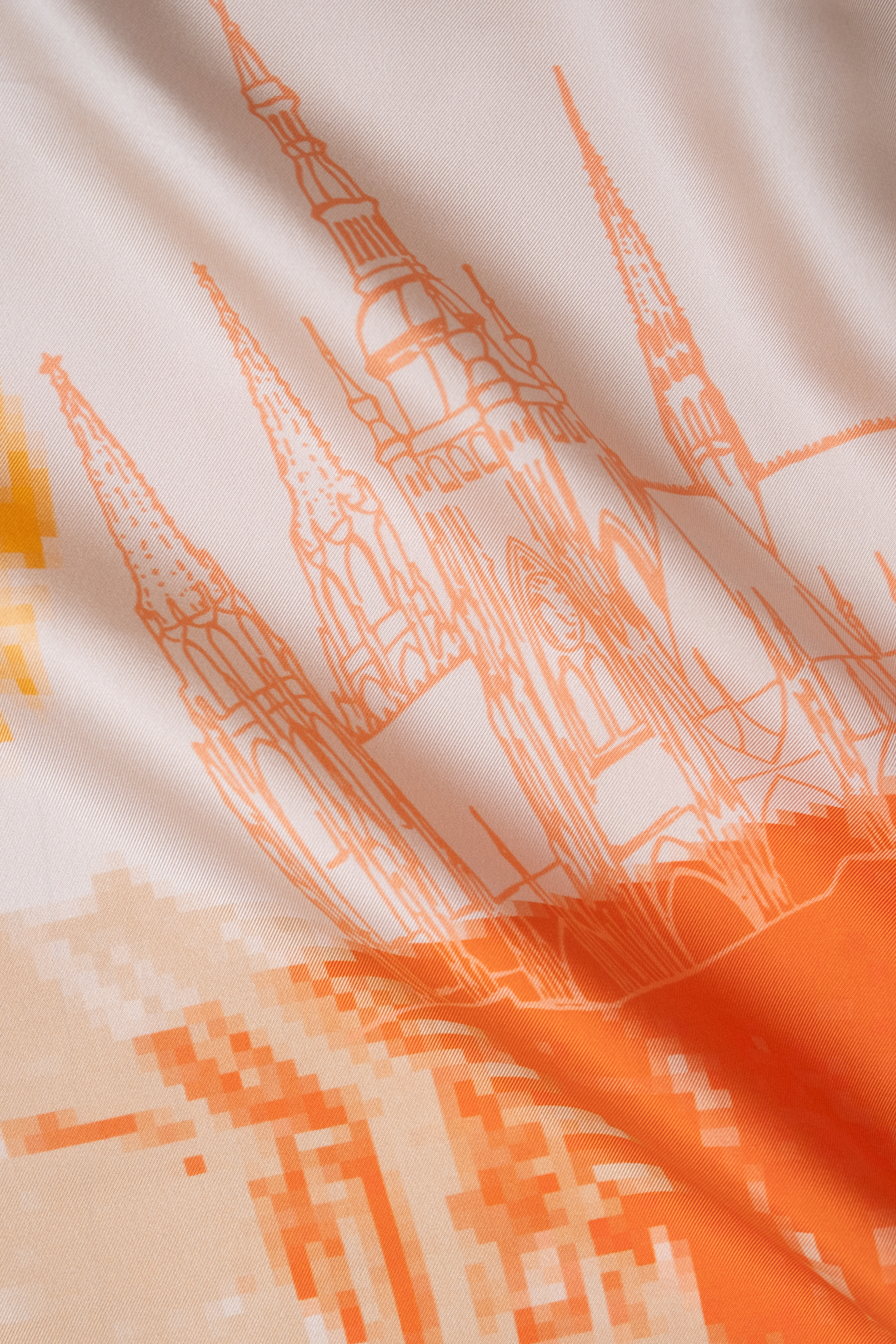 EMBLEMM Square Silk Scarf with Prague Print 'Distorted Prague' with pixelated and hand-drawn Prague Landmarks in Orange, Yellow and Cream Detail